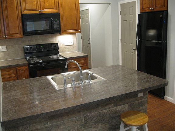 Under cabinet lighting and microwave