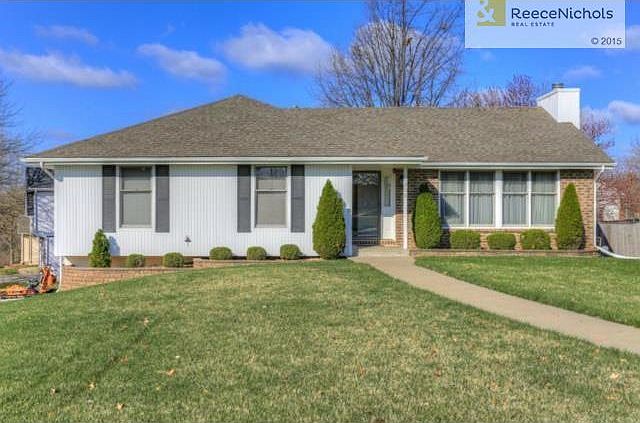 Wonderful vertical siding on this corner lot raised ranch