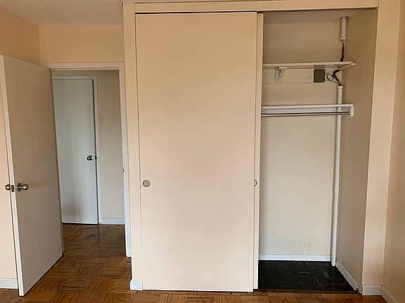 Spacious closet in bedroom.
