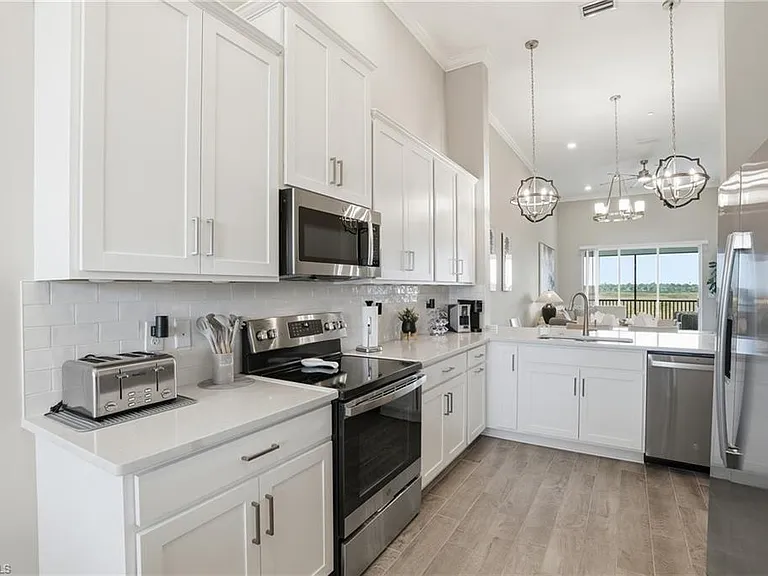 11851 Venetian Lagoon Dr #202 — Photo 8