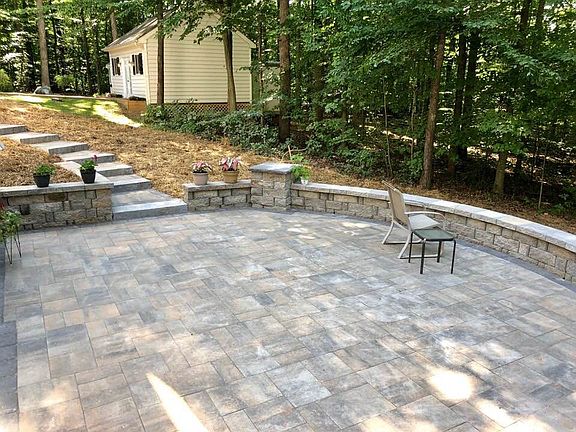 Patio w/ stairs to driveway