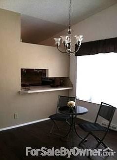 Dining Room
						:
						View of dining area and pass through to kitchen.