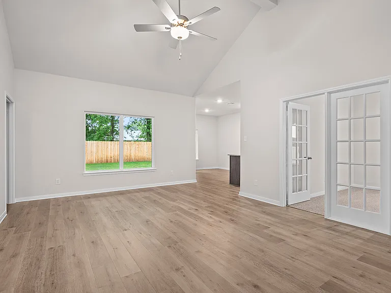 The living room sits right off of the kitchen.