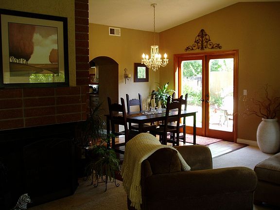 French doors lead to side patio from dining room