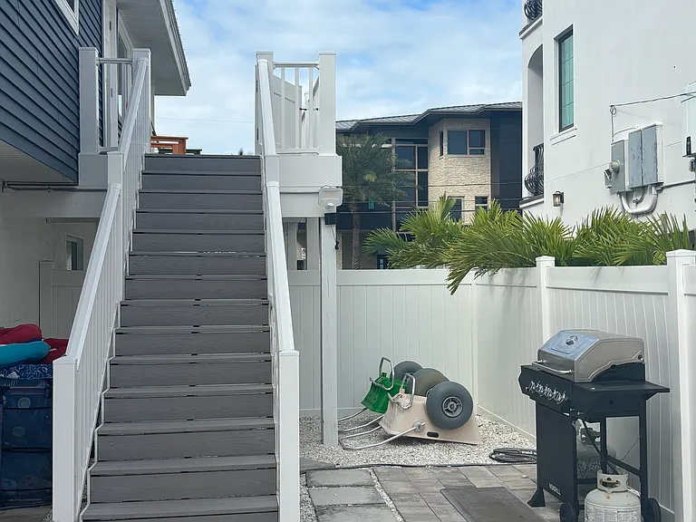 Stairs from Deck and Grilling area