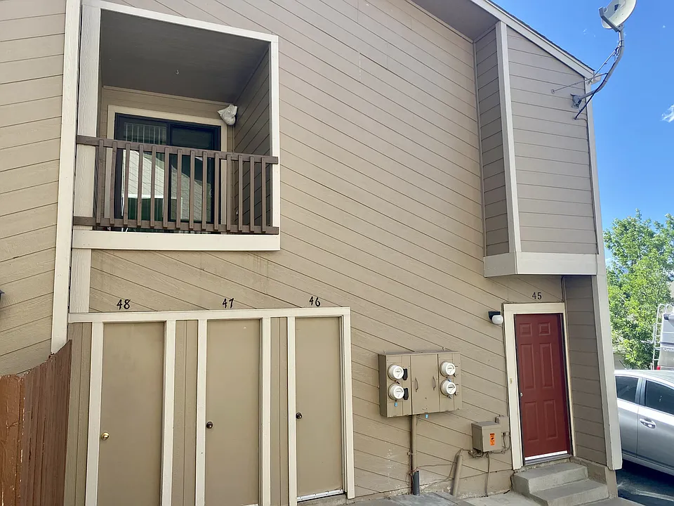 Private entrance and balcony with shared yard space.