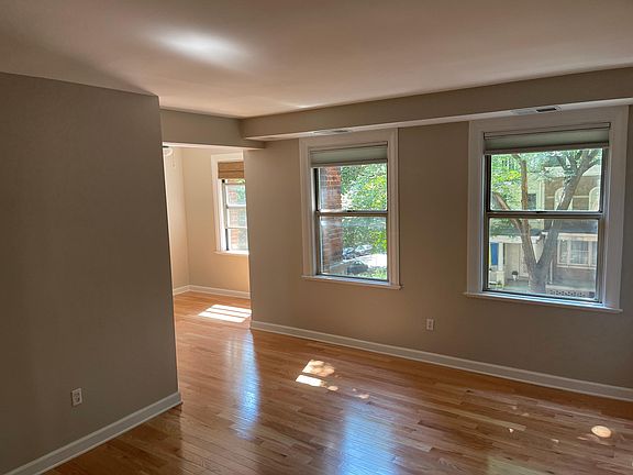 Living area with breakfast nook. Lots of afternoon light