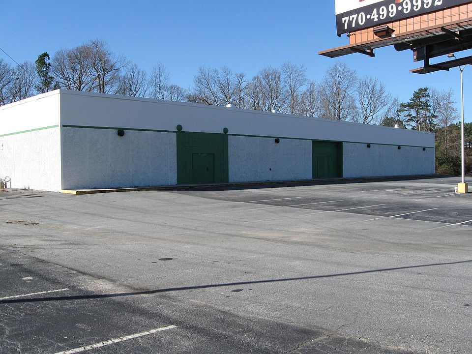 Large frontage on Jimmy Carter Blvd a high density road
