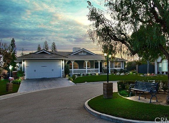 Adorable single story home offers neighborly front porch charm!