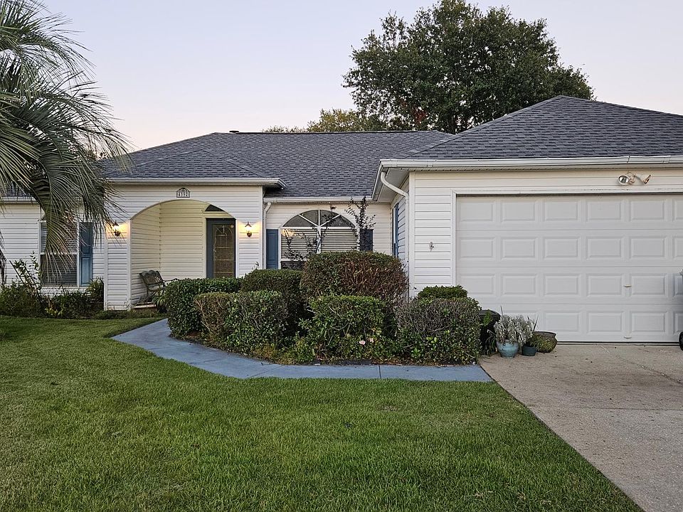 At the end of quiet cul-de-sac, beautiful yard with a 2- car garage and storage shed in back.