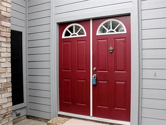 Contrast of the doors makes this fabulous home stand out.