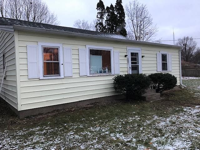 New windows, shutters, exterior doors, and trim.