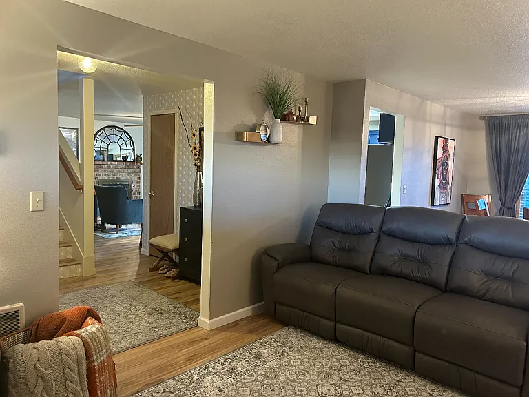 Another angle of the family room with a dining area.