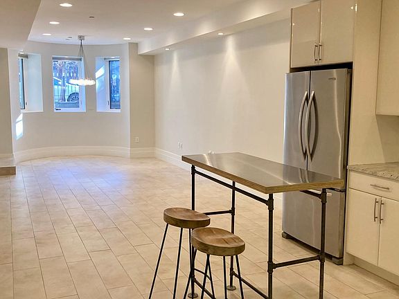 Open Living/Dinning/Kitchen with room for dinning table, couch/sitting area, and desk