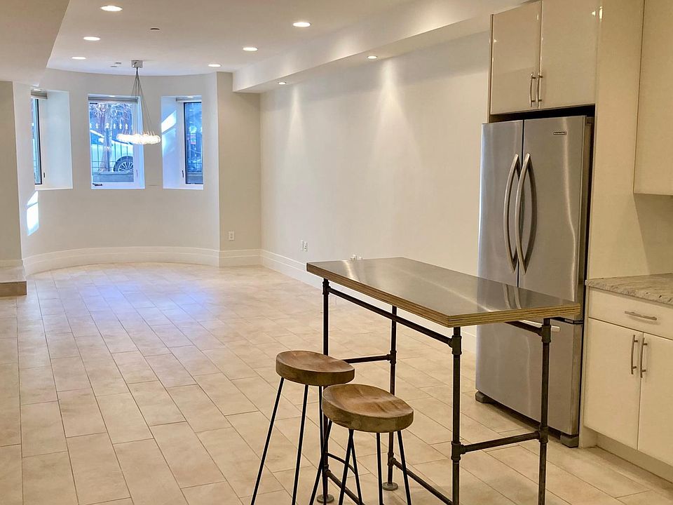 Open Living/Dinning/Kitchen with room for dinning table, couch/sitting area, and desk