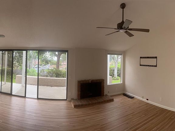 Living room with Fireplace and access to back patio