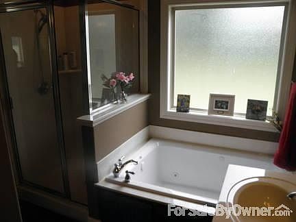 Master Bathroom
						:
						Jacuzzi tub, stand alone shower, double vanity, all marble. Tile floors