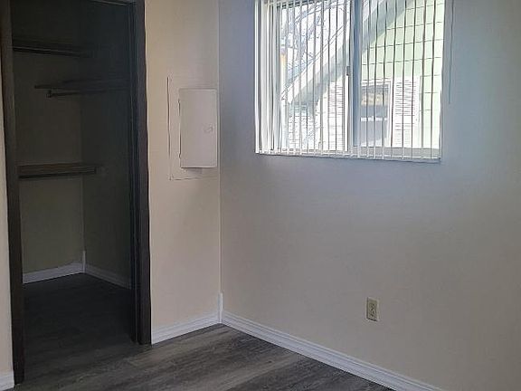 bedroom with walk-in closet