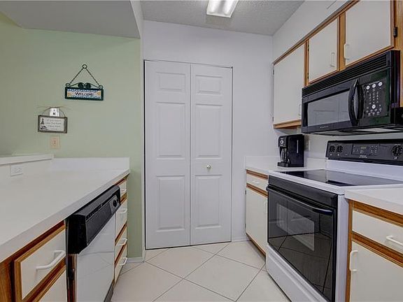 5th image of 2400 Feather Sound Dr APT 311