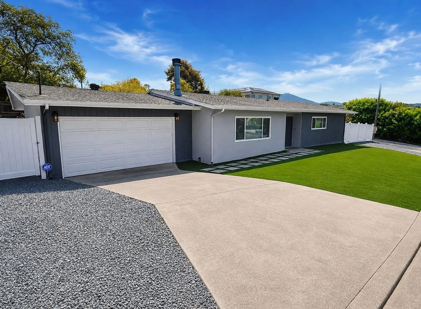 Updated 3 Bedroom Home with Modern Finishes, Private Yard & 2 Car Garage — Photo 1