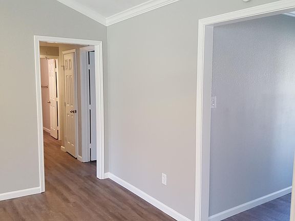 Bright home, new floors, fresh paint, crown molding throughout the property.