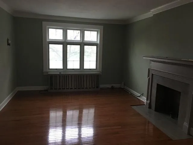 Incredibly Handsome Space 
9' Ceilings - Hardwood - Pella Windows
Large Living Room with Excellent Light and Corner for Home Office