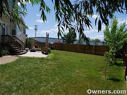 Large backyard, great for playing catch or evening fires.