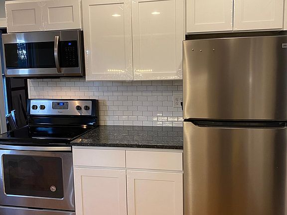 Brand new kitchen cabinets, granite countertops, and appliances