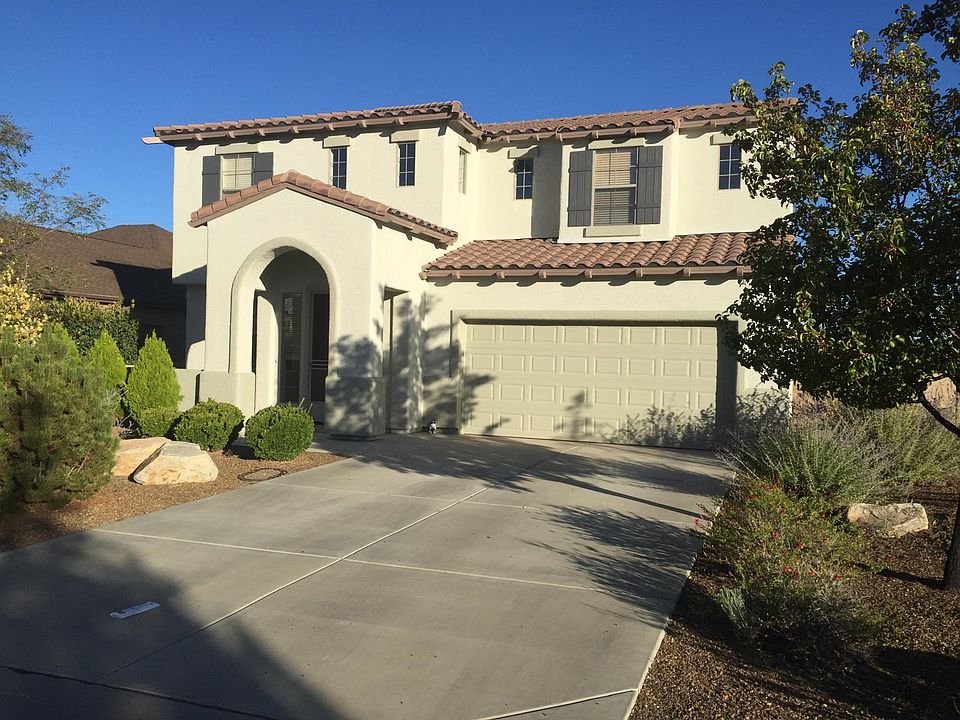 front yard facing quiet street.