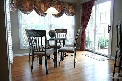 Kitchen table area with access to paver patio