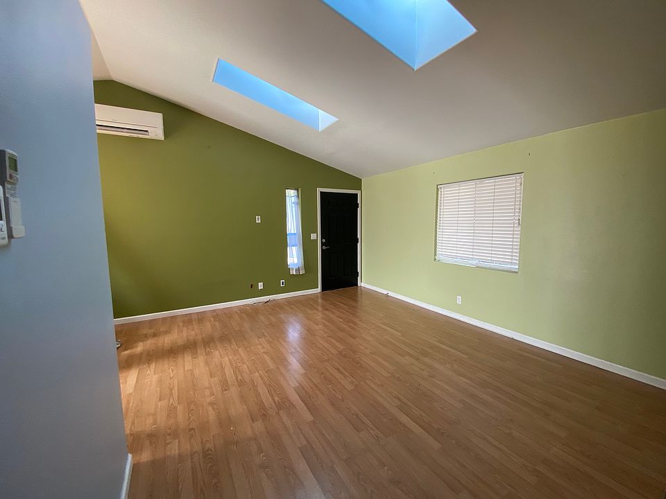 Living room with skylights to bring in the extra light!