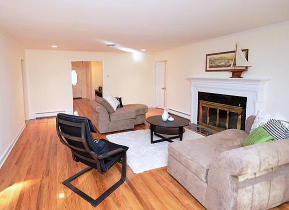 Liv Rm has a marble wood-burning fireplace