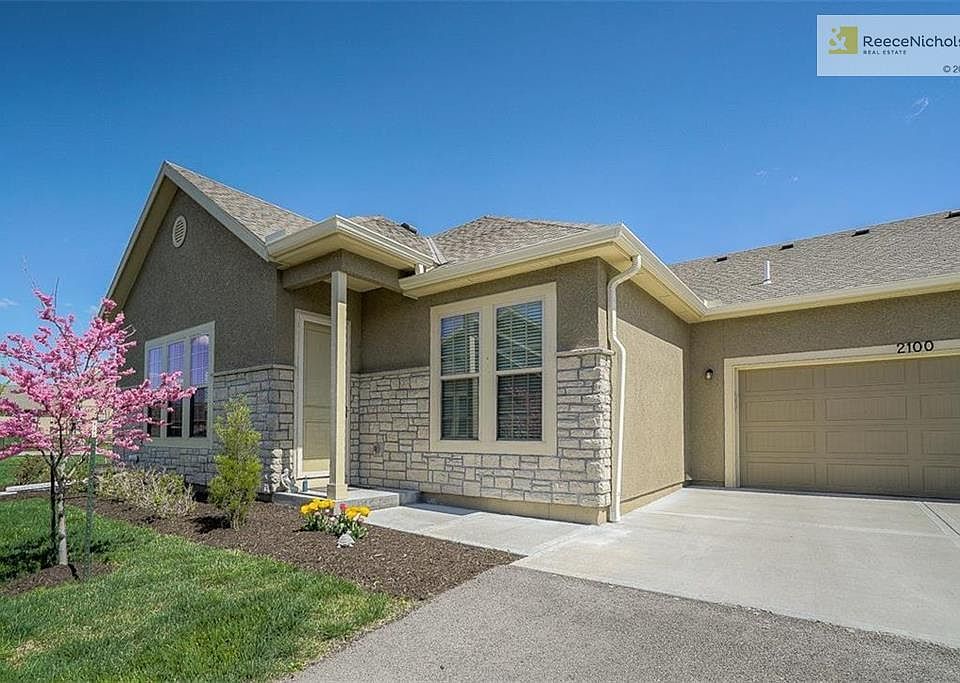 Front view showing the 2-car garage.