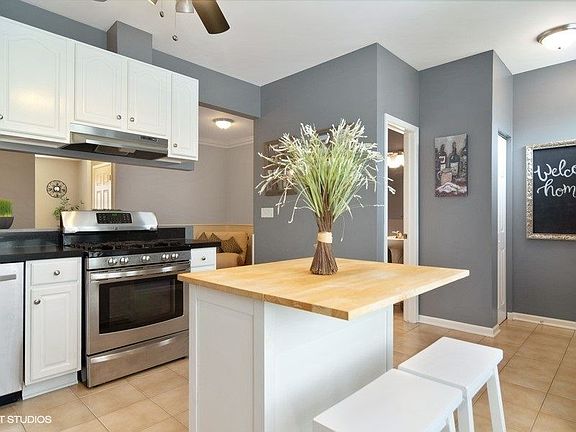 5th image of 240 N Village Ct