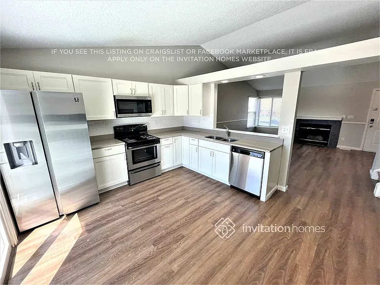4861 S Dunkirk Way — Photo 5