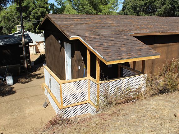 Rear of house with porch, washer dryer hookup