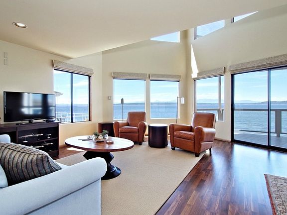 ENJOY THE MAIN FLOOR LIVING/DINING/GREAT ROOM VIEW, WALK OUT TO YOUR DECK  AND WATCH THE WORLD