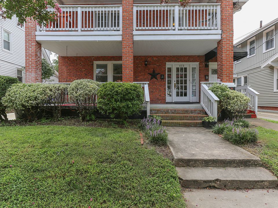 First-floor unit with separate entrance, mailbox & private porch