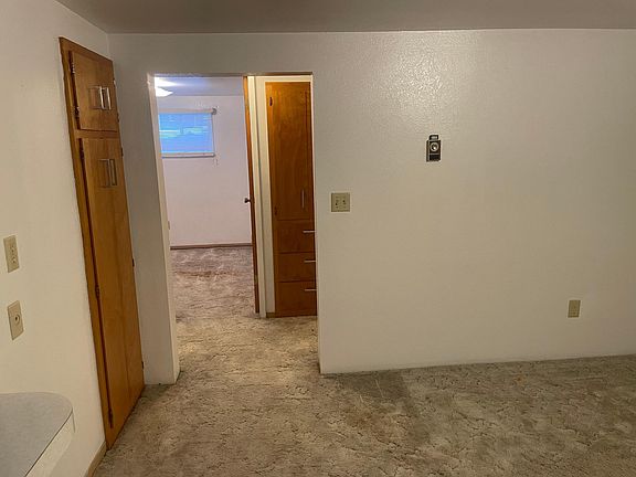 Living room looking into hall and bedroom
