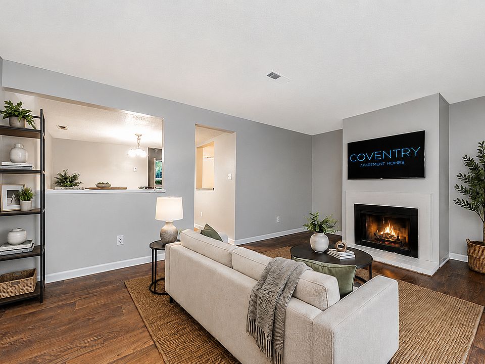 Spacious living room with hardwood-style flooring