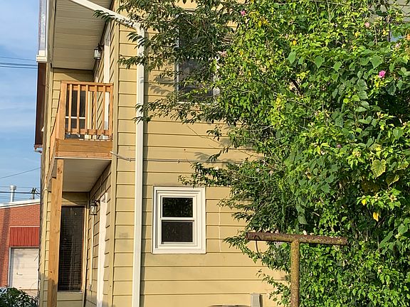 Rear of house, porch & balcony