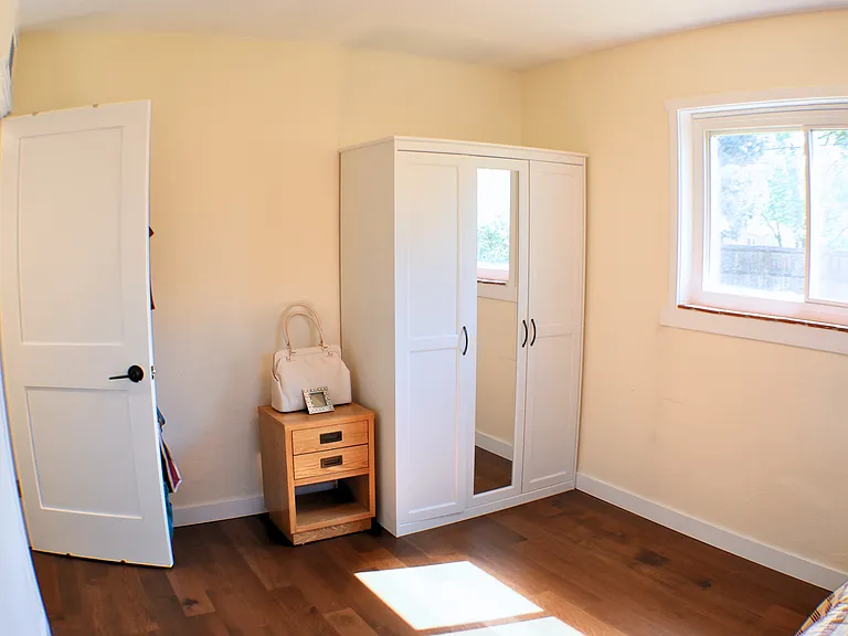 smaller bedroom, armoire