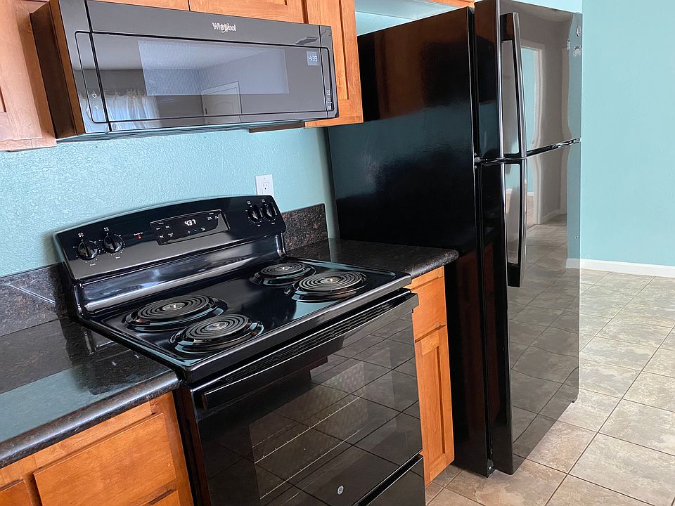 Matching refrigerator, range, and microwave (dishwasher not pictured)