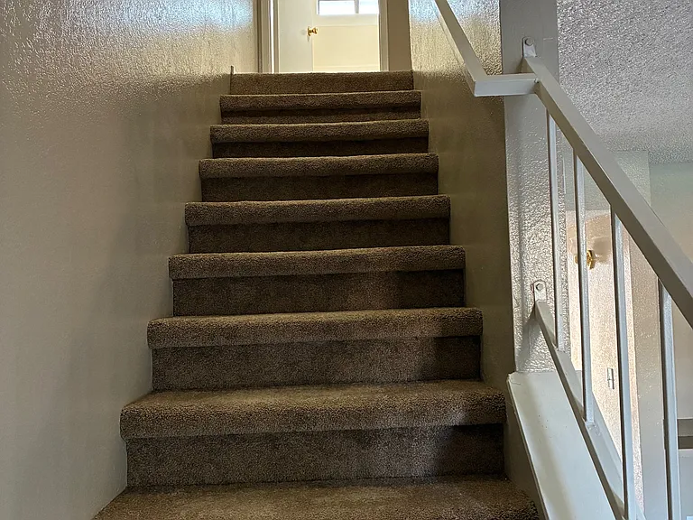 Very secured stairway to living quarters. Bedrooms and bathroom upstairs.