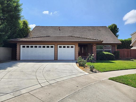 3 Car Direct Access Garage with long driveway