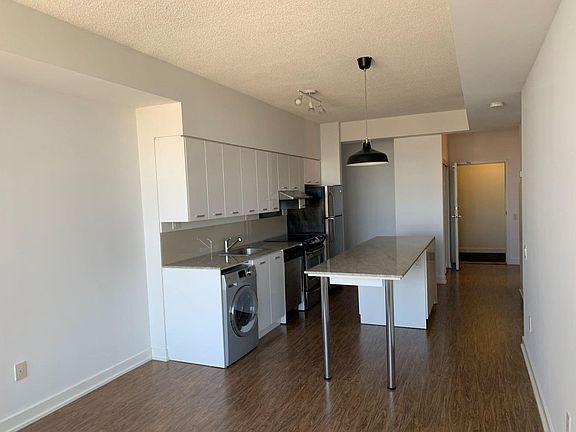 Kitchen + Den + Entrance Foyer