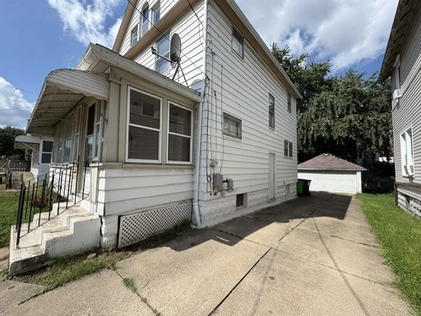 Spacious 4-Bedroom Barberton Home with Enclosed Front Porch — Photo 2