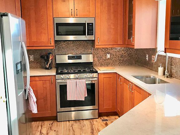 Remodeled Kitchen 
- Includes Counter with 2 Bar Stools