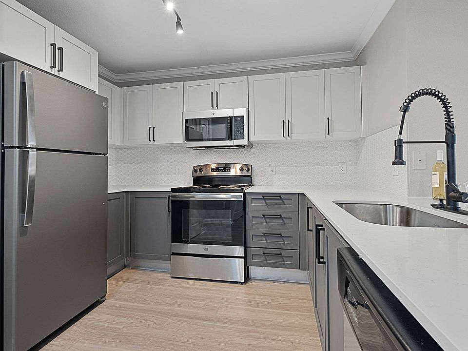 Newly remodeled kitchen with stainless steel appliances and black finishes