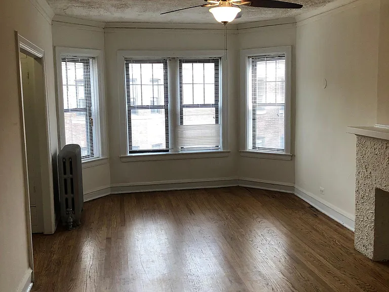 Spacious Living rm w decorative fireplace